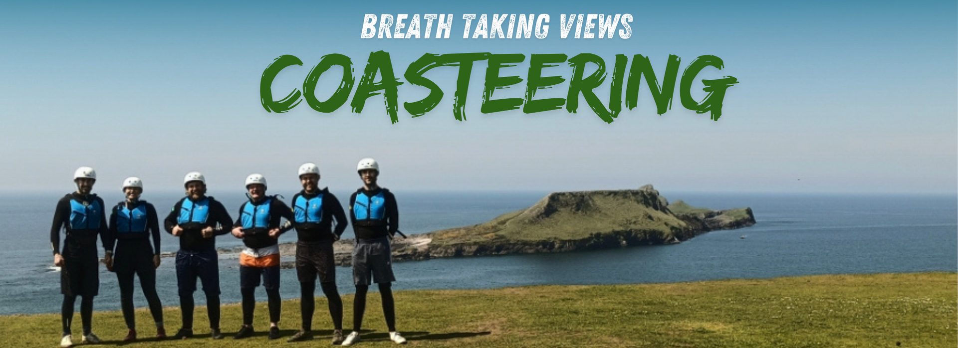 Coasteering adventure on rocky coastline