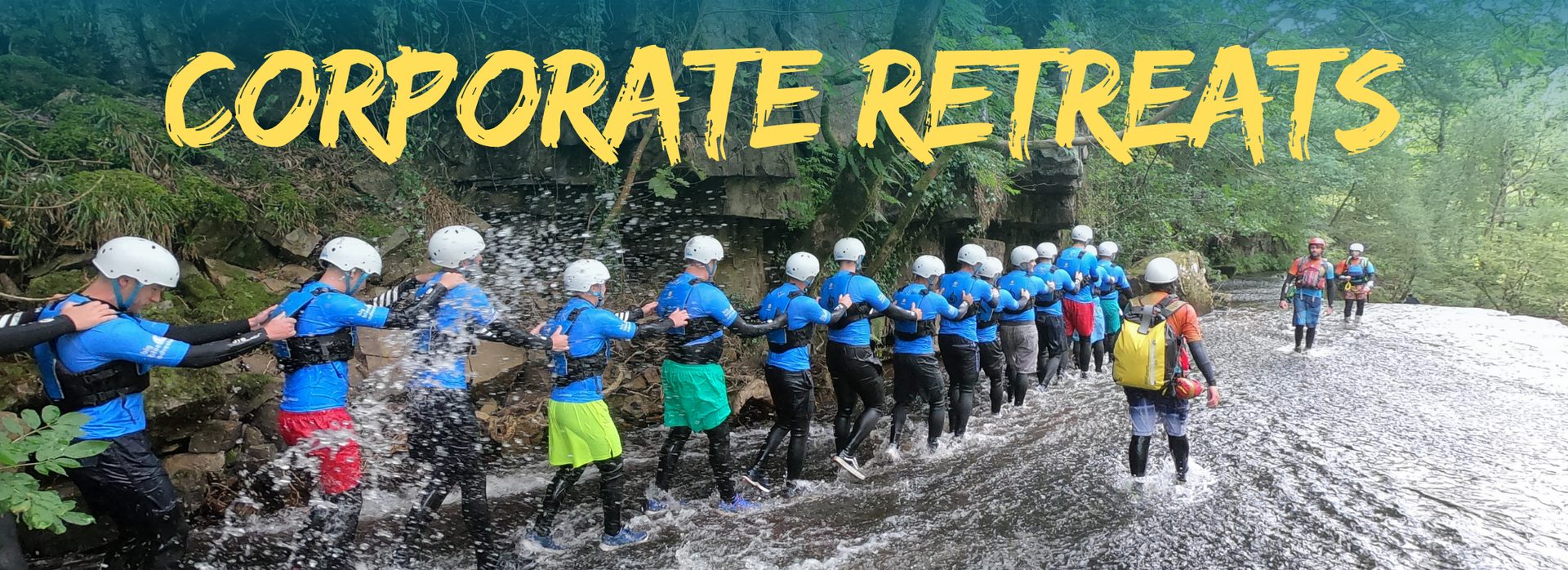 Corporate team completing an outdoor challenge